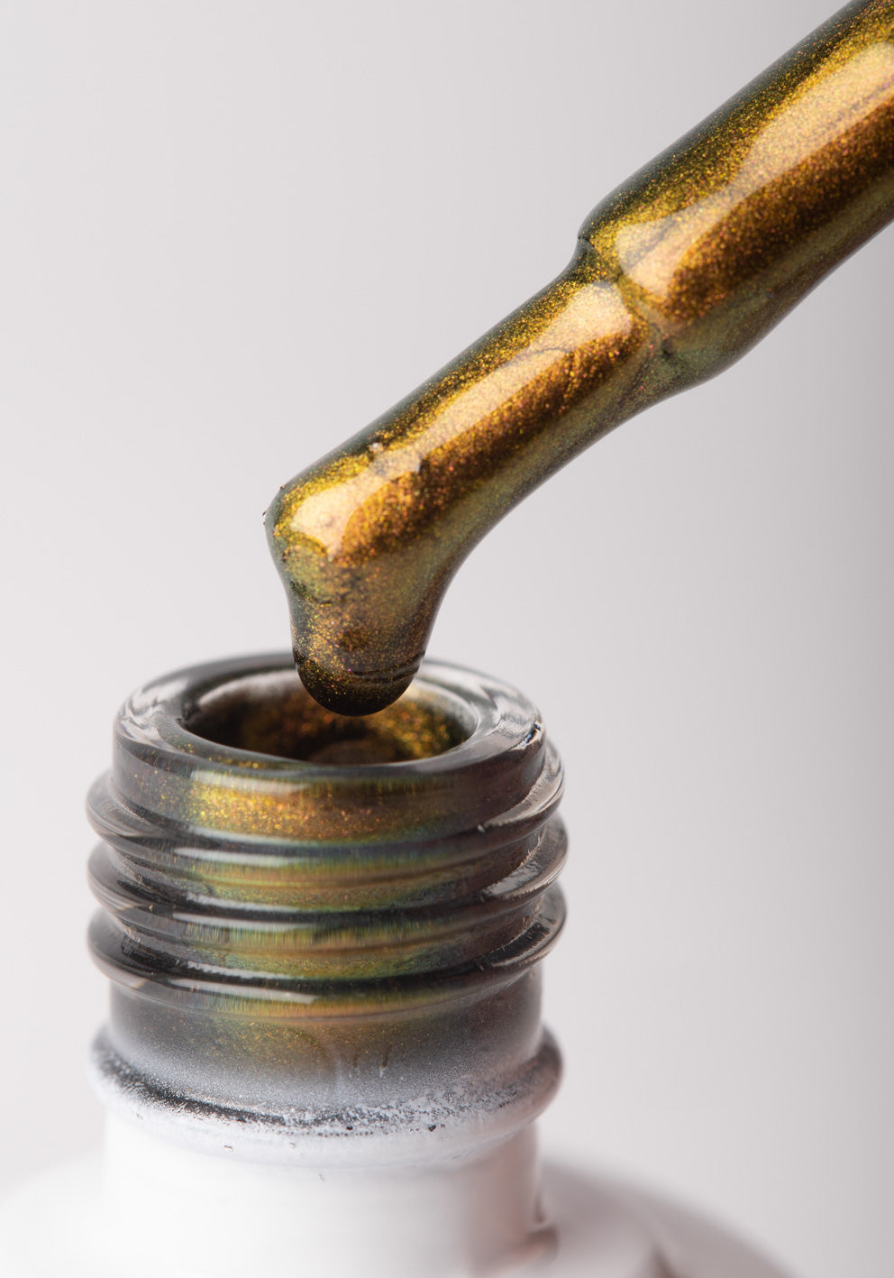 Esmalte semipermanente glitter dorado 14 ml - B06